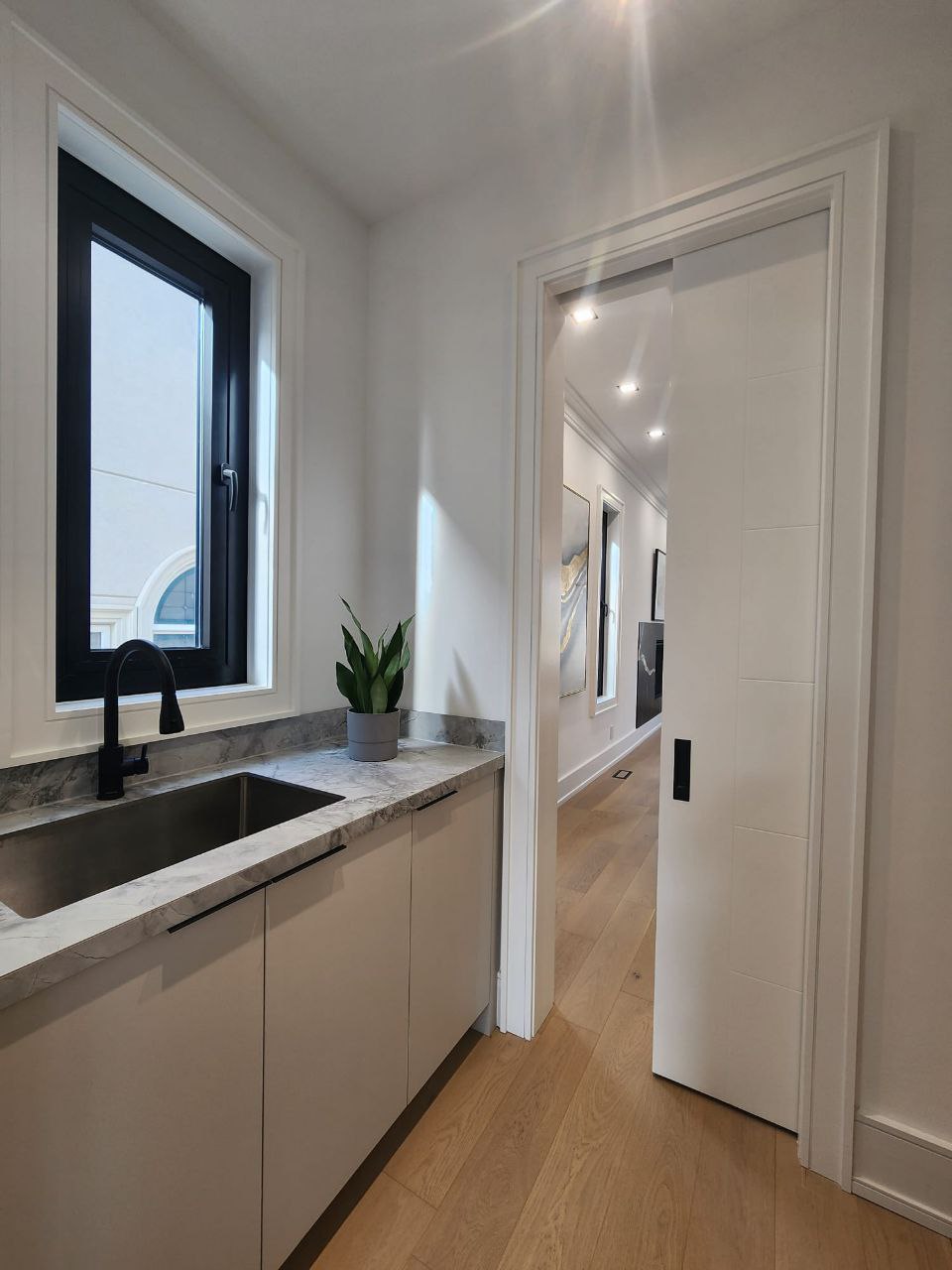 Main floor powder room with accent wall
