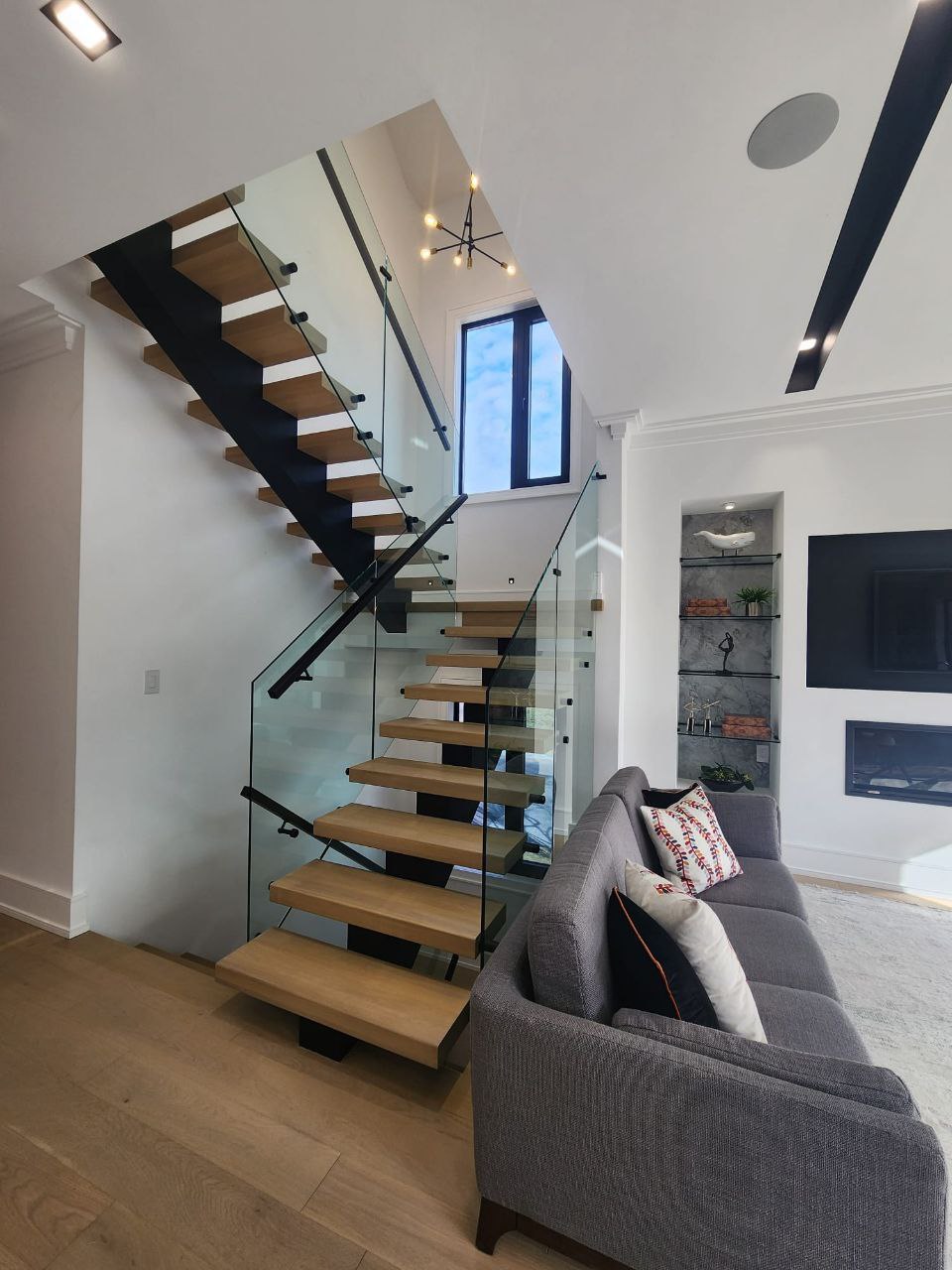 Modern staircase design with glass railing