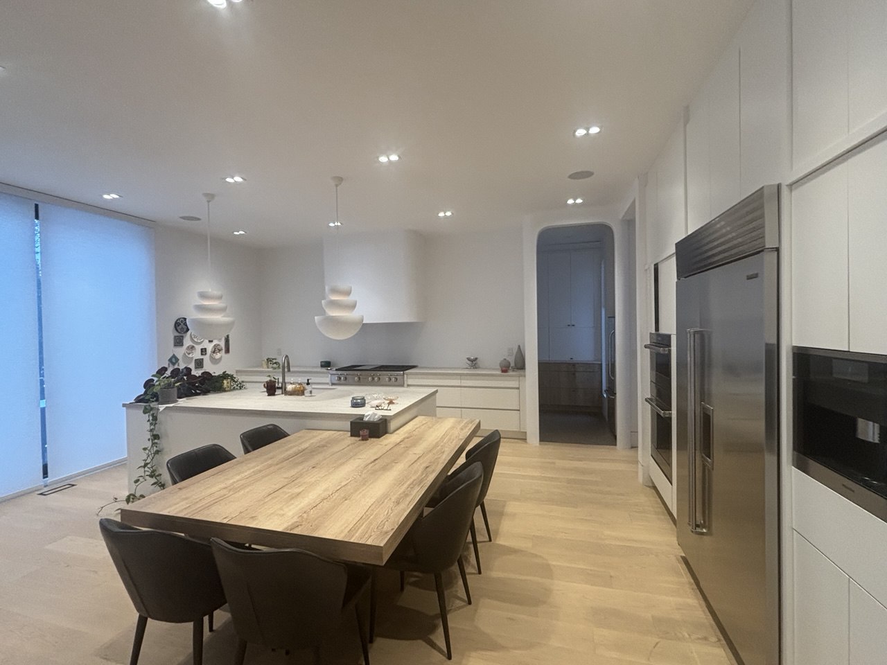 Elegant dining room illustrating open flow to living areas