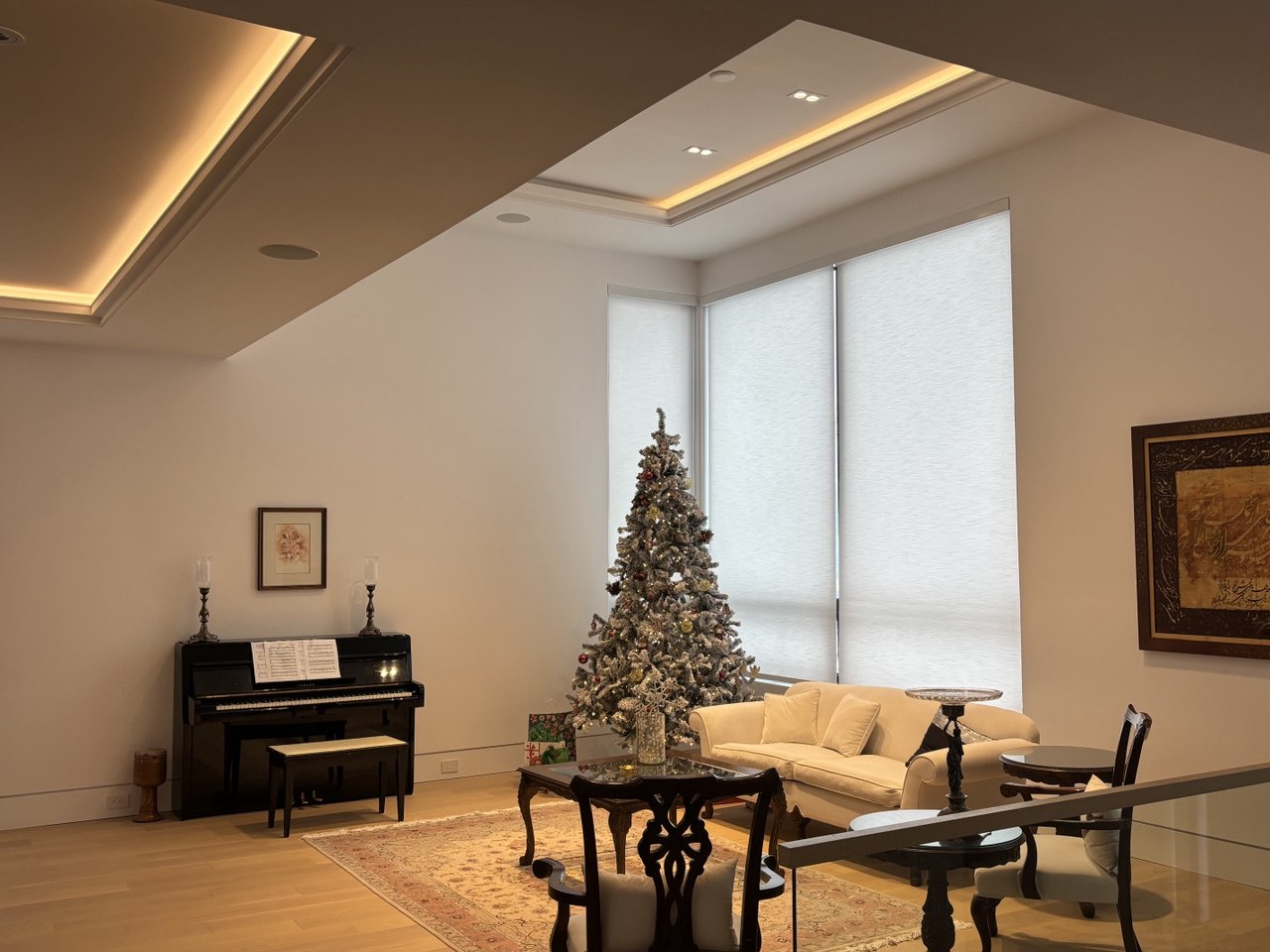 Contemporary living space perfect for entertaining, with modern lighting fixtures