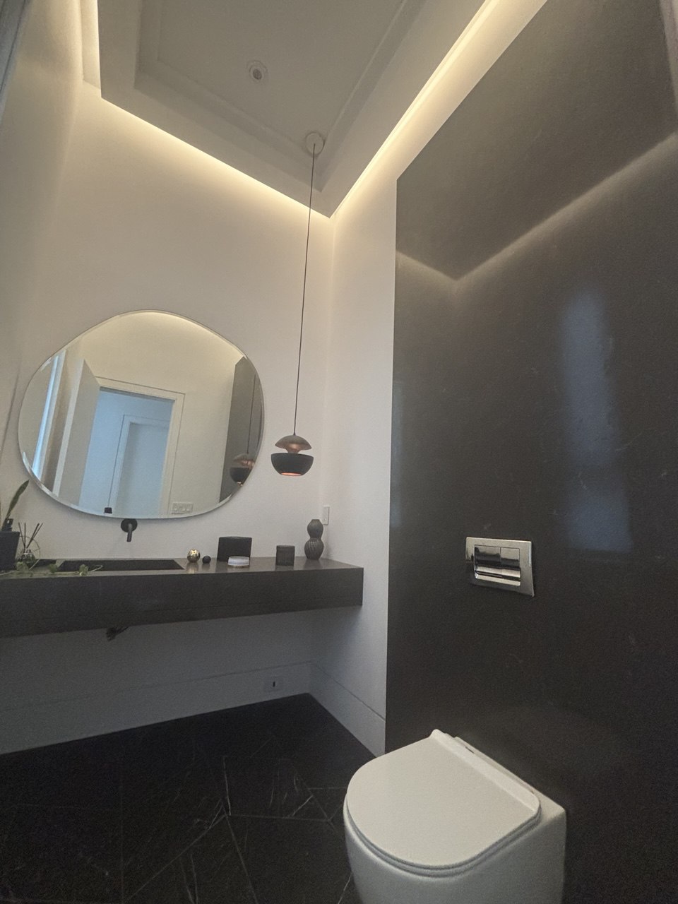 Architectural floating staircase with glass railings and modern design details